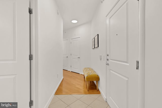 1021 N Garfield St Unit B37, Arlington, VA 22201 - hall with light tile patterned floors, recessed lighting, and baseboards