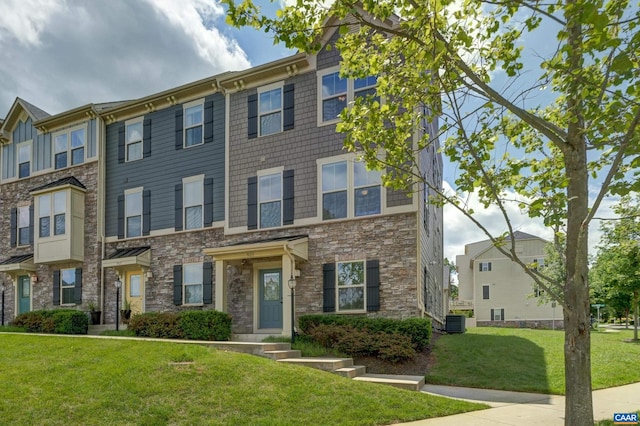 905 Flat Waters Ln, Charlottesville, VA 22911 - view of front of home featuring a front lawn, stone siding, and cooling unit