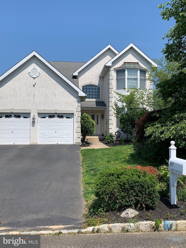 407 Laurel Creek Blvd, Moorestown, NJ 08057 - view of front of home featuring asphalt driveway and a garage
