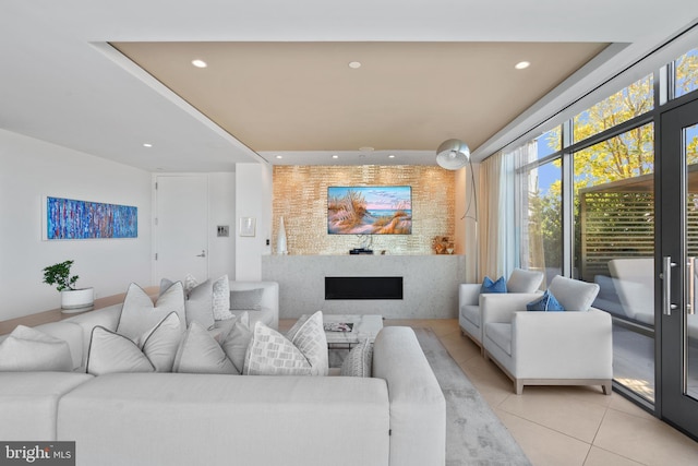 810 O St NW Unit 504, Washington, DC 20001 - living area with light tile patterned flooring, recessed lighting, and a fireplace
