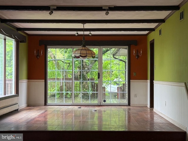 790 Hopewell Rd, Downingtown, PA 19335 - unfurnished dining area featuring wainscoting, baseboard heating, plenty of natural light, beamed ceiling, and track lighting