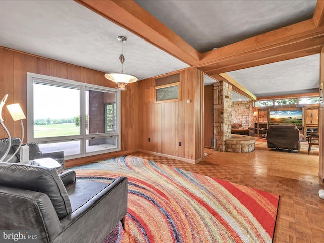 927 Thompson Ave, Jonestown, PA 17038 - living room featuring wooden walls and beamed ceiling