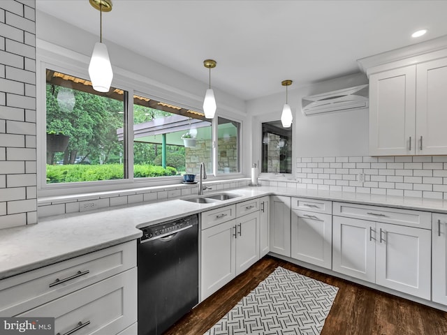 927 Thompson Ave, Jonestown, PA 17038 - kitchen featuring dishwasher, a wall mounted AC, dark wood finished floors, white cabinets, and backsplash