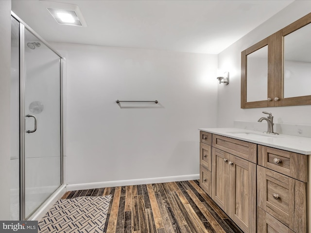 927 Thompson Ave, Jonestown, PA 17038 - full bathroom with wood finished floors, vanity, and a shower stall