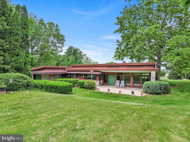 927 Thompson Ave, Jonestown, PA 17038 - rear view of property with a patio, a yard, and stone siding