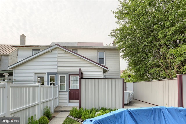 1311 Church St, Lititz, PA 17543 - back of property with a deck and a chimney