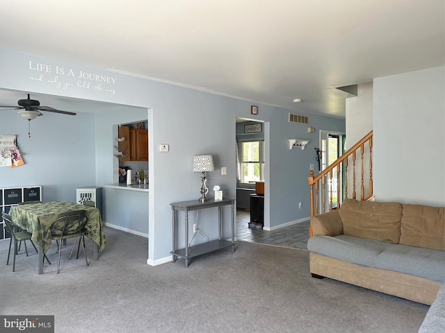584 Meadow Ln, Pennsburg, PA 18073 - carpeted living area with ceiling fan, baseboards, and stairs