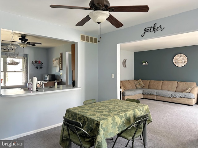 584 Meadow Ln, Pennsburg, PA 18073 - dining space featuring carpet floors and ceiling fan