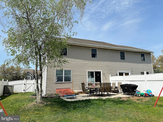 584 Meadow Ln, Pennsburg, PA 18073 - back of property featuring a gate and a patio
