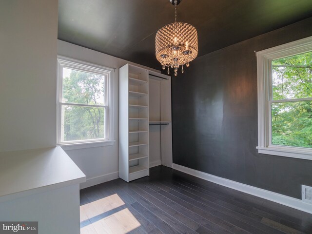 2509 Mason St, Silver Spring, MD 20902 - unfurnished dining area with a chandelier, plenty of natural light, baseboards, and dark wood-type flooring