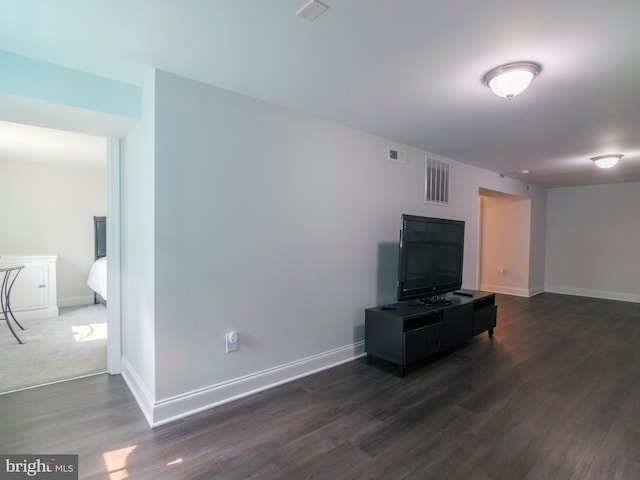 2509 Mason St, Silver Spring, MD 20902 - unfurnished living room featuring dark wood-type flooring and baseboards