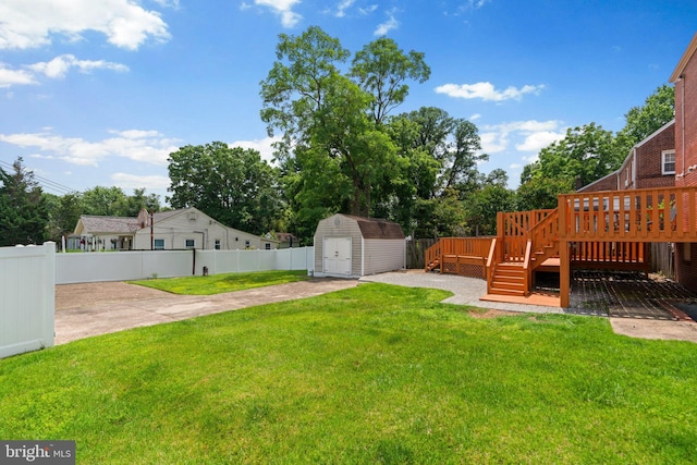 6317 Taylor Rd, Riverdale, MD 20737 - view of yard with a deck and a storage shed