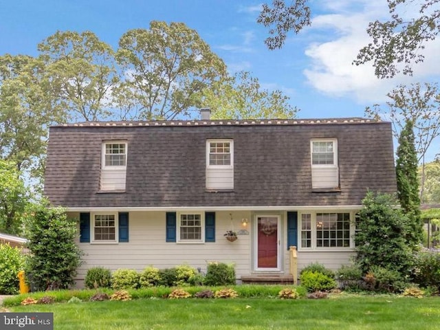 525 Center Dr, Severna Park, MD 21146 - colonial inspired home with roof with shingles and a front lawn