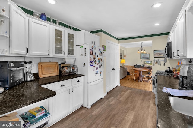 525 Center Dr, Severna Park, MD 21146 - kitchen with black microwave, white cabinetry, a chandelier, and recessed lighting