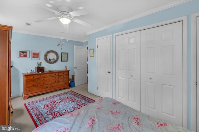 525 Center Dr, Severna Park, MD 21146 - bedroom with ornamental molding, ceiling fan, attic access, light carpet, and a closet