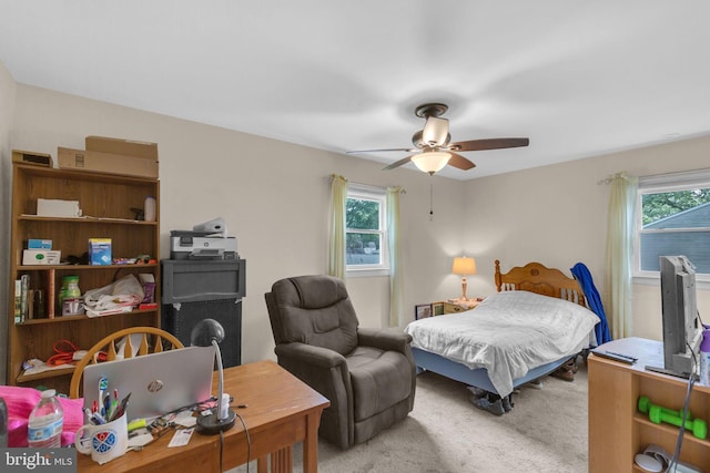 525 Center Dr, Severna Park, MD 21146 - bedroom with carpet flooring, multiple windows, a ceiling fan, and a desk