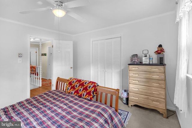 525 Center Dr, Severna Park, MD 21146 - bedroom featuring crown molding, a closet, ceiling fan, and light colored carpet