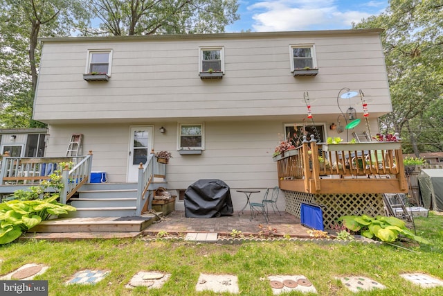 525 Center Dr, Severna Park, MD 21146 - rear view of house featuring a wooden deck and a patio