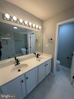 5920 Plata St, Clinton, MD 20735 - full bathroom with marble finish flooring and double vanity