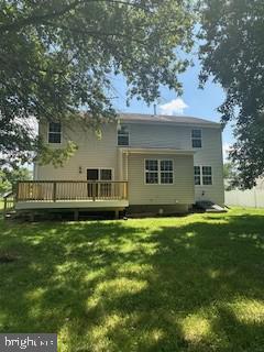 5920 Plata St, Clinton, MD 20735 - back of house featuring a wooden deck and a yard