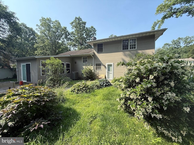 187 Merion Rd, Dover, DE 19904 - rear view of property with central AC unit