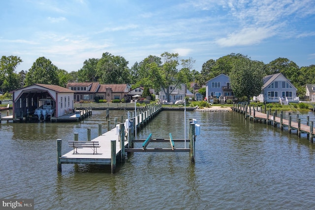 3685 1st Ave, Edgewater, MD 21037 - dock with boat lift, a water view, and a residential view