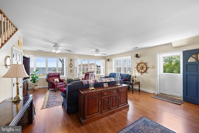 3685 1st Ave, Edgewater, MD 21037 - living area featuring wood finished floors, baseboards, stairs, and ceiling fan