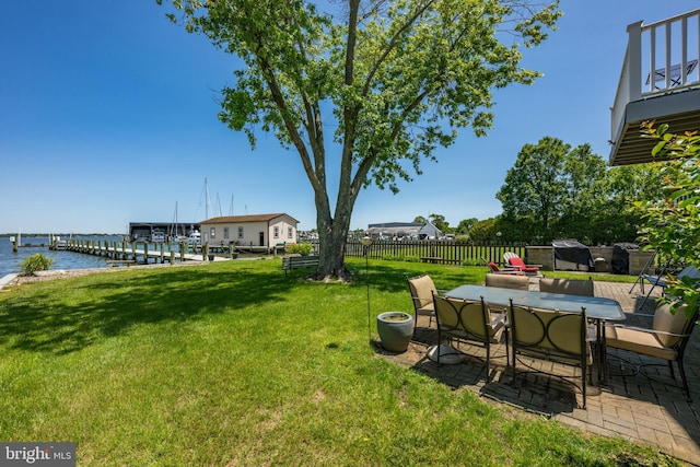 3685 1st Ave, Edgewater, MD 21037 - view of yard featuring a patio area, a water view, a dock, and outdoor dining space
