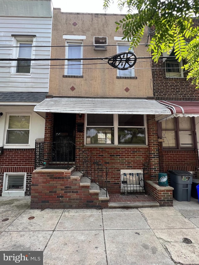 2311 S Bucknell St, Philadelphia, PA 19145 - doorway to property featuring brick siding
