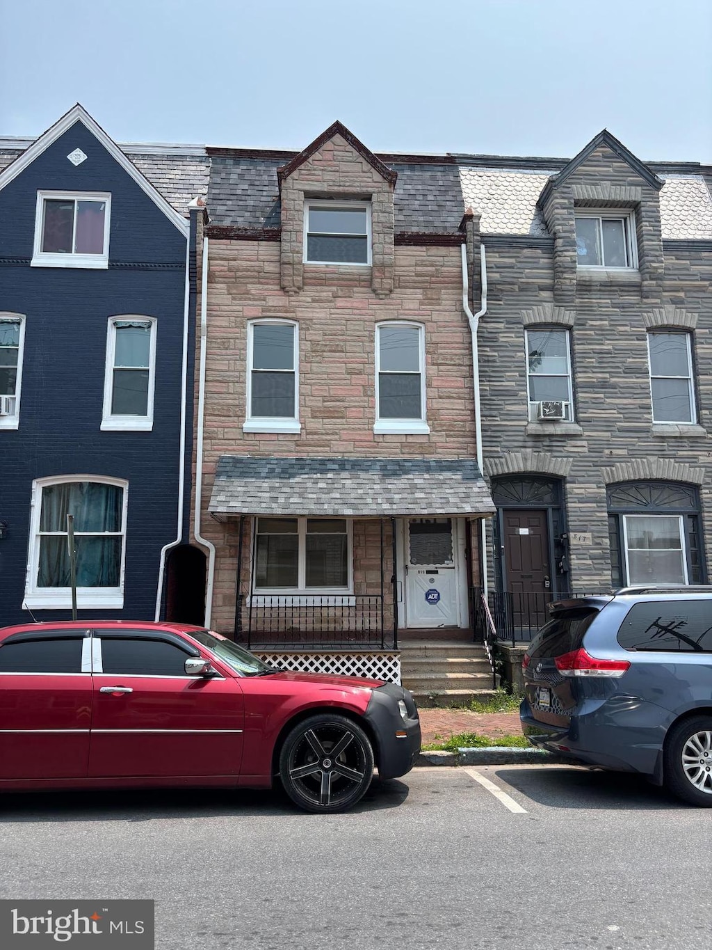 819 N 10th St, Reading, PA 19604 - townhome / multi-family property with stone siding