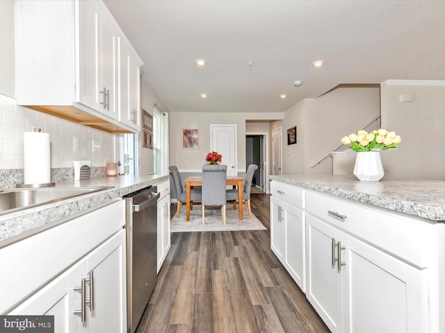 38 Herman Gaver Pl, Hagerstown, MD 21740 - kitchen with stainless steel dishwasher, dark wood-style floors, white cabinets, recessed lighting, and backsplash