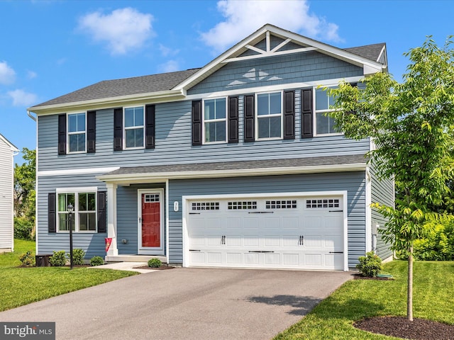 38 Herman Gaver Pl, Hagerstown, MD 21740 - view of front of property with a garage, asphalt driveway, and a front lawn