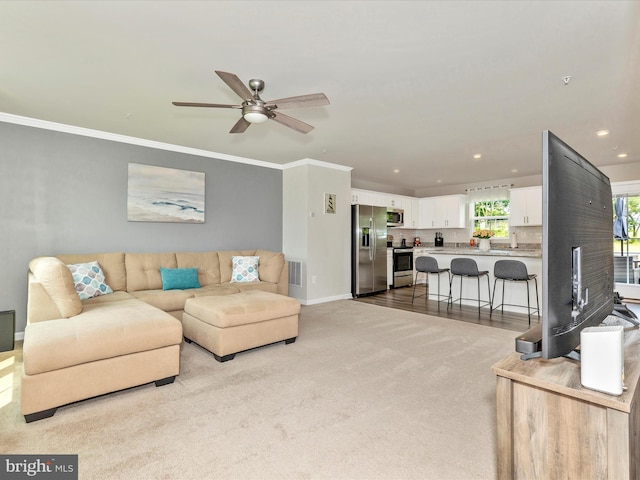 38 Herman Gaver Pl, Hagerstown, MD 21740 - living area featuring light colored carpet, recessed lighting, a ceiling fan, and ornamental molding
