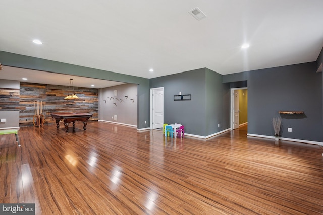 21550 Wild Timber Ct, Broadlands, VA 20148 - unfurnished living room with pool table, wood finished floors, and baseboards
