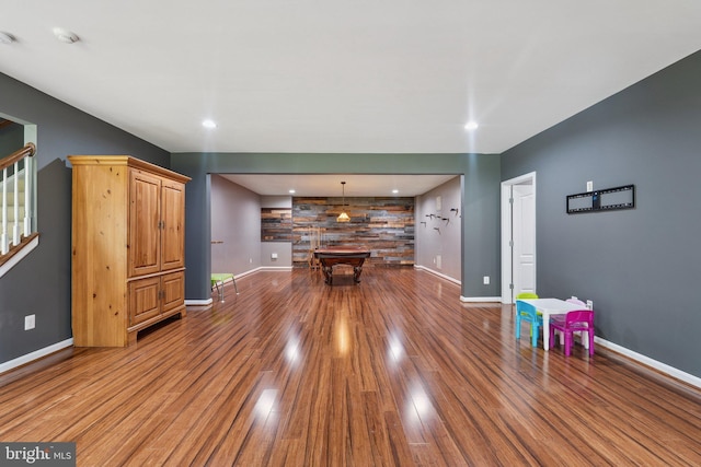 21550 Wild Timber Ct, Broadlands, VA 20148 - unfurnished living room featuring wood finished floors, baseboards, stairs, recessed lighting, and billiards