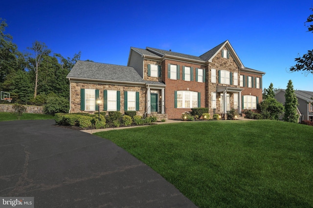21550 Wild Timber Ct, Broadlands, VA 20148 - view of front of property with a front yard and brick siding
