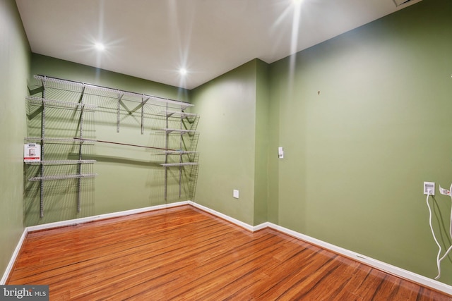 21550 Wild Timber Ct, Broadlands, VA 20148 - unfurnished room featuring wood finished floors and baseboards