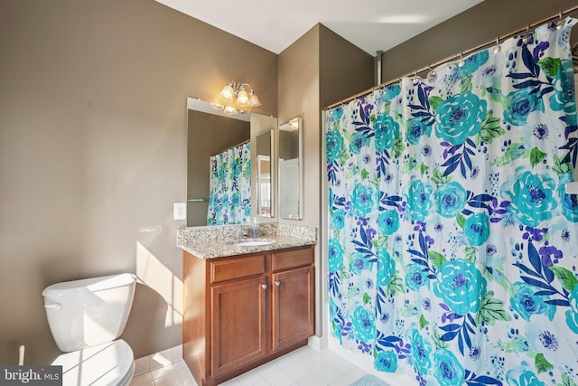 21550 Wild Timber Ct, Broadlands, VA 20148 - bathroom with vanity, toilet, tile patterned flooring, and curtained shower