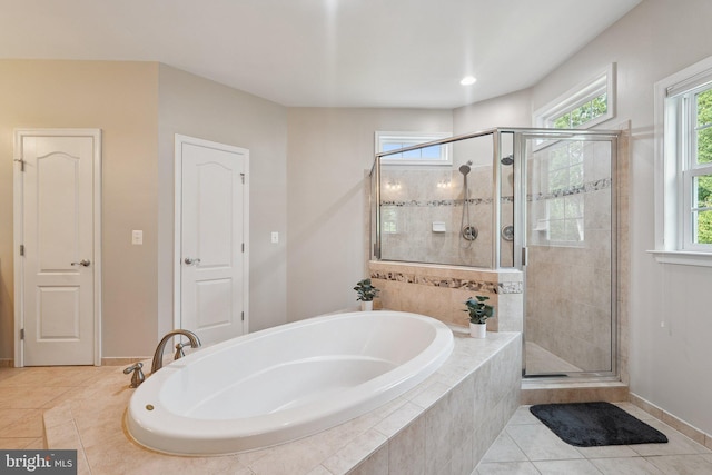 21550 Wild Timber Ct, Broadlands, VA 20148 - bathroom with a garden tub, a shower stall, tile patterned flooring, and baseboards