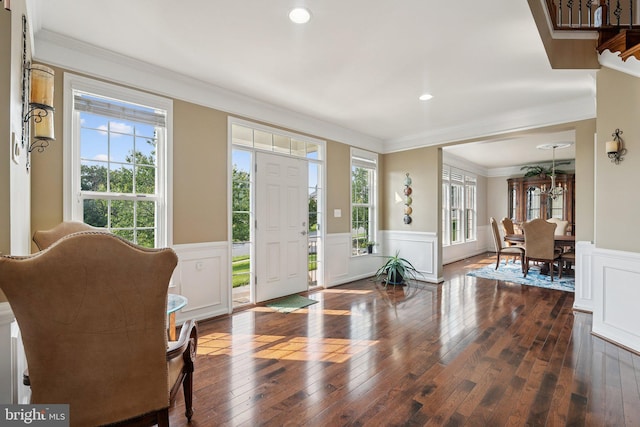 21550 Wild Timber Ct, Broadlands, VA 20148 - foyer entrance featuring a wainscoted wall, crown molding, hardwood / wood-style flooring, a decorative wall, and recessed lighting