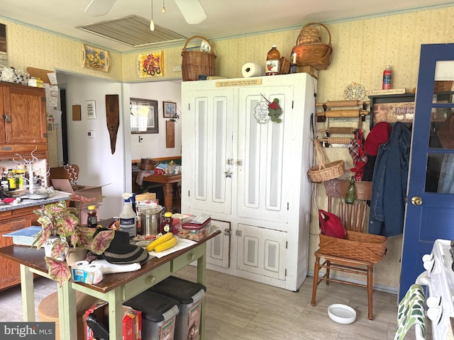 32 Meadow Ln, Gettysburg, PA 17325 - kitchen featuring wallpapered walls, ceiling fan, brown cabinets, and white stove
