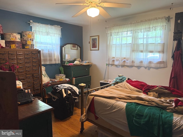 32 Meadow Ln, Gettysburg, PA 17325 - bedroom with multiple windows, wood finished floors, and ceiling fan