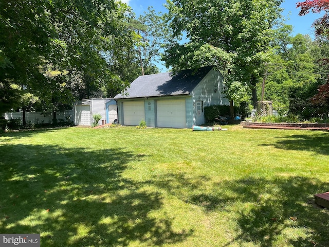 2545 Pioneer Rd, Hatboro, PA 19040 - view of green lawn with an outbuilding and a detached garage