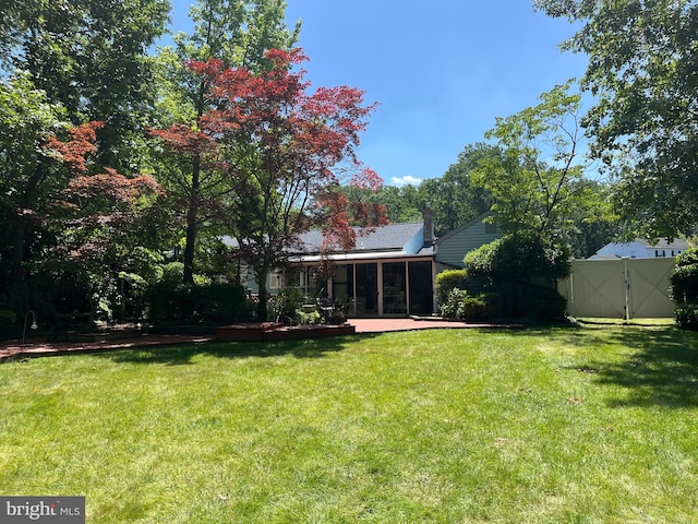 2545 Pioneer Rd, Hatboro, PA 19040 - view of yard featuring a sunroom and a gate