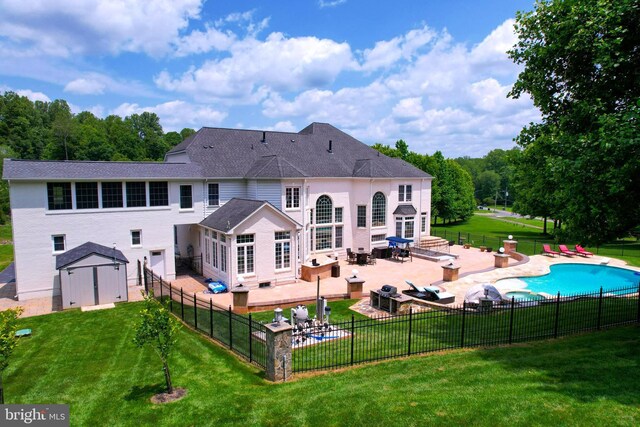 2506 Coulter Ln, Oakton, VA 22124 - rear view of house with a patio area, a fenced backyard, a garage, a shed, and entry steps