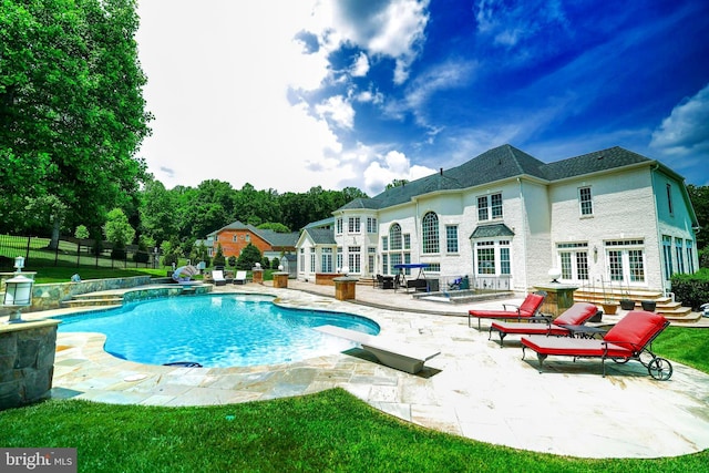 2506 Coulter Ln, Oakton, VA 22124 - view of pool featuring french doors, a patio, a pool with connected hot tub, and a diving board