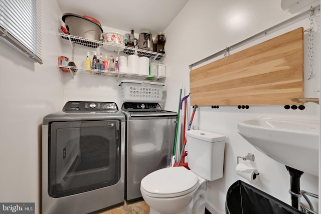 149 N Railroad Ave, Frackville, PA 17931 - bathroom with washing machine and clothes dryer and toilet