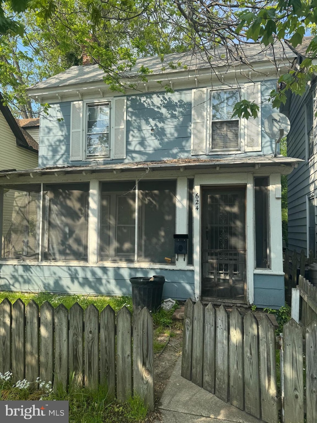 624 High St, Chestertown, MD 21620 - view of front of home featuring a sunroom and a chimney