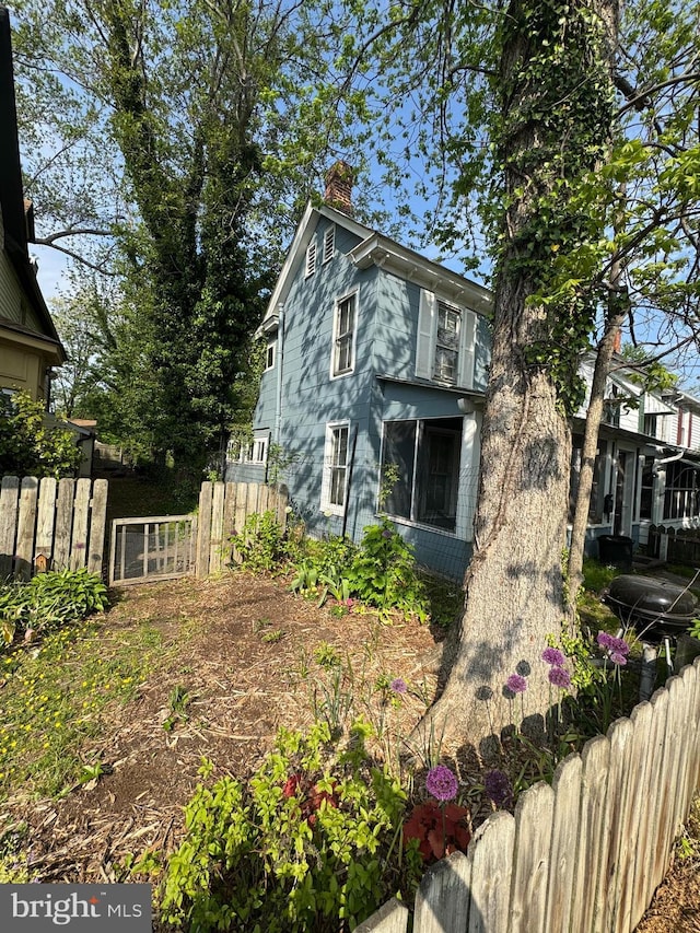 624 High St, Chestertown, MD 21620 - view of side of home with a chimney
