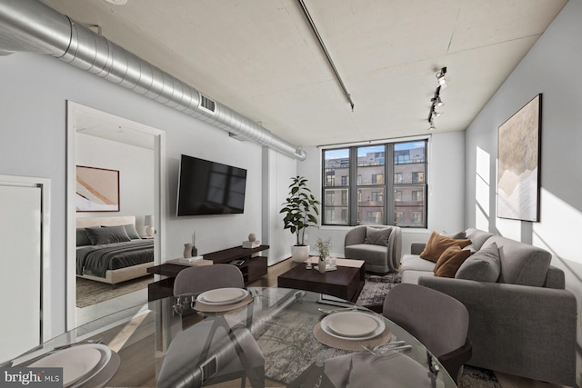 2125 14th St NW Unit 618, Washington, DC 20009 - living area featuring wood finished floors and rail lighting